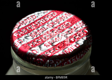 Milk bottle top close-up Stock Photo