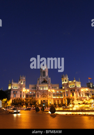 Plaza de Cibeles, one of Madrid's most beautiful square with the neo-gothic palace where is located the city hall. Stock Photo
