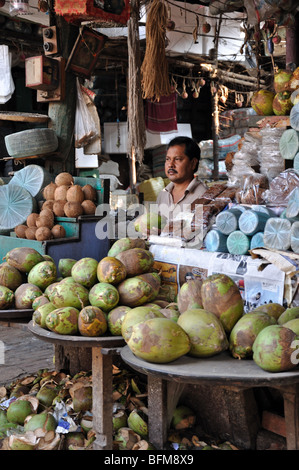 A Coconut Seller near New Market, Kolkata (Calcutta), West Bengal, India Stock Photo