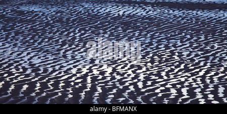 Aerial view of ripples in the sand on a tidal Estuary. Stock Photo