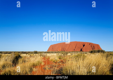 Australia, Northern Territory, Uluru-Kata Tjuta National Park.   Uluru (Ayers Rock) at sunset.  (PR) Stock Photo