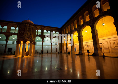Syria, Damascus, Umayyad Mosque. The Dome of the Treasury stands illuminated in the evening. Stock Photo