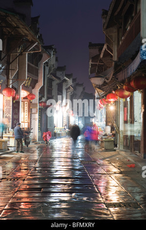 China, Anhui Province, Huangshan city, rain soaked streets in the old town Stock Photo