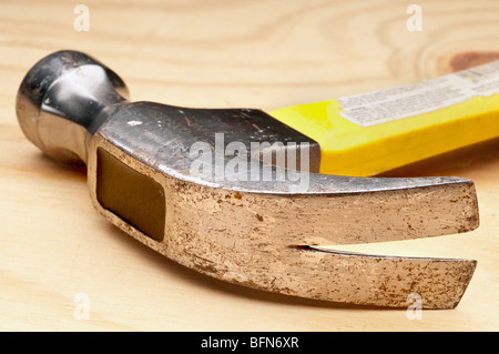 shallow focus close up of an old hammer on wood Stock Photo