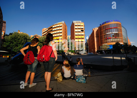 Teenagers, Marlene-Dietrich-Platz square in front of musical theater, casino and Blueman Group Theater, Potsdamer Platz, Berln. Stock Photo