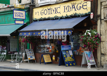 Colourful shop front in Glastonbury High Street Somerset England Stock Photo