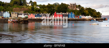 Panoramic photo of sea front and harbourside of Tobermory, Isle of Mull, Scotland taken on a bright but cloudy day Stock Photo