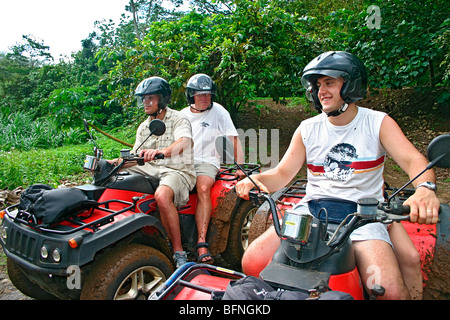 ATV adventure down back trails of interior Moorea, Tahiti Stock Photo