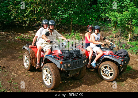 ATV adventure down back trails of interior Moorea, Tahiti Stock Photo