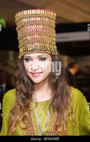 Model wearing original headgear presented at the Saudi Gulf Luxury Trade Fair Stock Photo