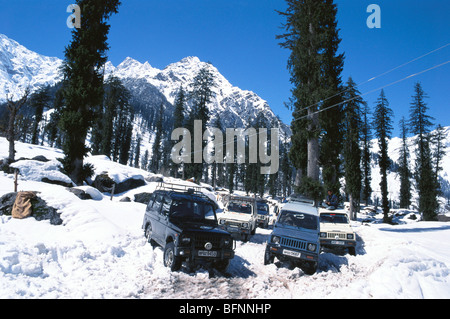 NMK 62567 : Gypsy maruti on snow covered road ; Solang valley ; Manali ; Himachal Pradesh ; India Stock Photo