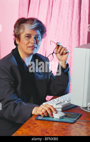 HMA 61863 : Working lady working on computer MR#268 Stock Photo