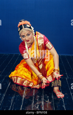 Bharatanatyam ; Bharata Natyam ; Bharathanatyam ; Bharatha Natyam ; Indian classical dancer ;  showing ghungroo ; India ; Asia ; MR#604 Stock Photo