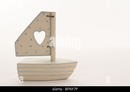 White wooden boat on white background