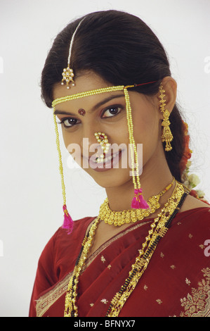 Indian brides ; Maharashtrian bride ; wedding jewelry ; marriage ornaments ; India ; Asia ; Model Release # 627 Stock Photo