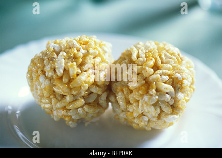 NVM 62219 : Sweet puffed rice balls ; kurmura ladoo ; India Stock Photo