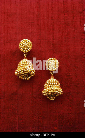 Gold jewellery , earring ornaments , India Stock Photo