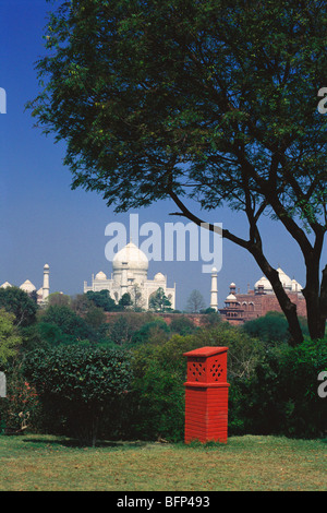 Taj Mahal with red light box ; ivory white marble mausoleum ; Agra ; Uttar Pradesh ; India ; Asia Stock Photo