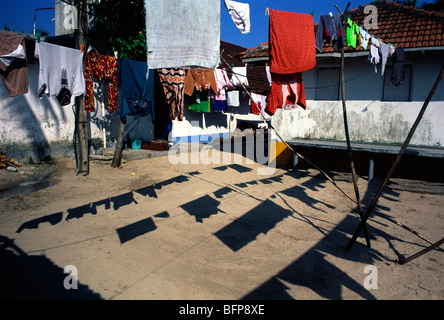 Clothes drying and shadow ; Minicoy Island ; Maliku atoll ; Lakshadweep ; India ; asia Stock Photo