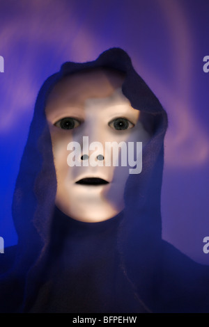Cloaked Alien. Stock Photo
