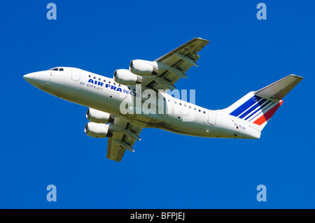 Avro RJ85 operated by Cityjet on behalf of Air France climbing out after taking off from Birmingham Airport, UK. Stock Photo