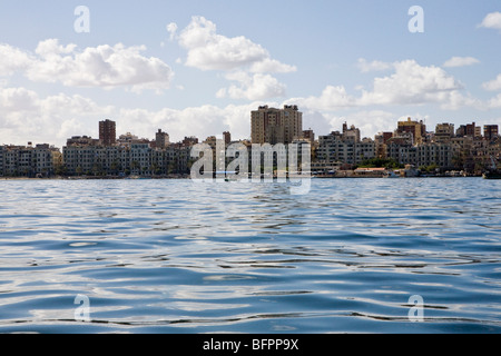 View of the corniche taken from a boat in the Eastern Harbour of the city of Alexandria, Egypt Stock Photo