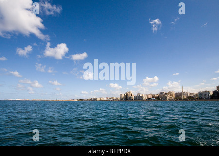 View of the corniche taken from a boat in the Eastern Harbour of the city of Alexandria, Egypt Stock Photo