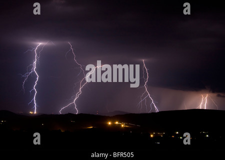 A lightning strike during a thunderstorm in the countryside Stock Photo ...