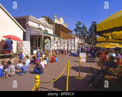 Kids watching a magician show at Gold Reef City Stock Photo