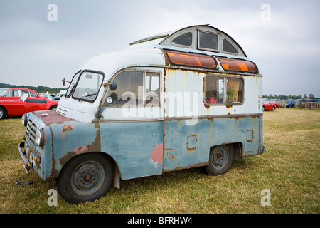 Vintage rusty 1957 Bedford CA Calthorpe Home Cruiser camper van parked at Goodwood Revival, Goodwood, West Sussex, UK Stock Photo