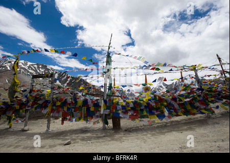 Prayer flags at the Kumzum pass on the road from Manali to Kaza Northern India. Stock Photo