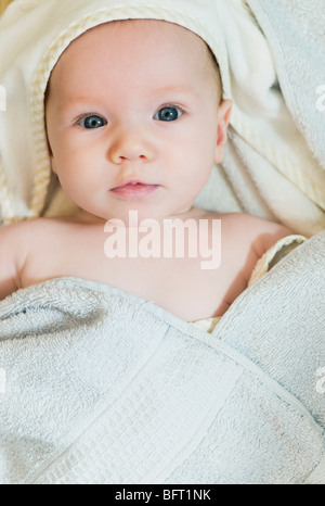 Baby Wrapped in Towel Stock Photo