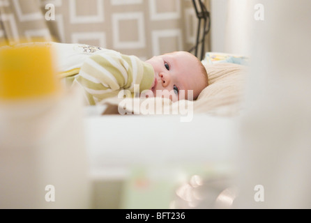 Baby in Crib Stock Photo