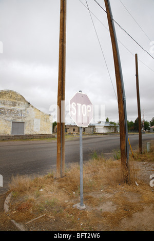 Faded Stop Sign at Corner, Marfa, Presidio County, West Texas, Texas, USA Stock Photo