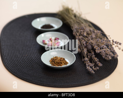 Dried Flowers in Small Bowls Stock Photo