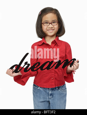 Girl Holding Dream Sign Stock Photo