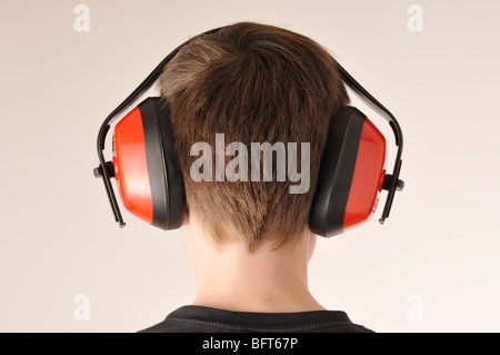 Boy Wearing Antinoise Headphones Stock Photo