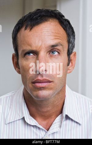 Portrait of Man Looking Thoughtful Stock Photo
