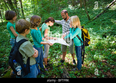 teacher and pupils at the wood Stock Photo