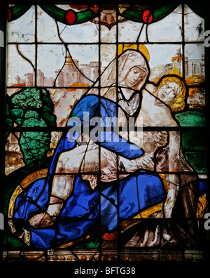 Detail of a 16th century stained glass window depicting the Pietà, probably Flemish in origin, Wilton Parish Church, Wilton, Wiltshire Stock Photo