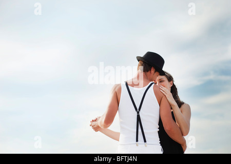 couple dancing on the beach Stock Photo