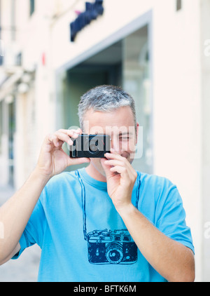 man using camera Stock Photo