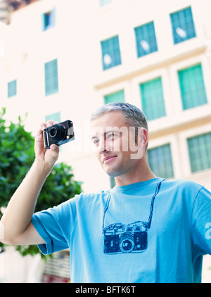 man using camera Stock Photo
