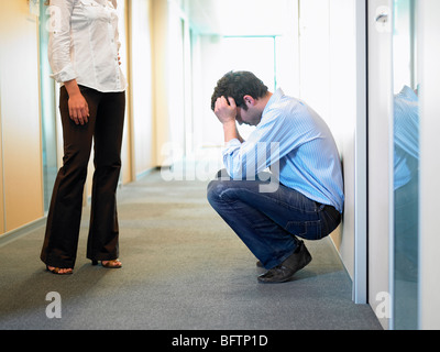 Couple having problems at work Stock Photo