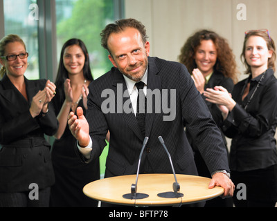 Business man giving a conference Stock Photo