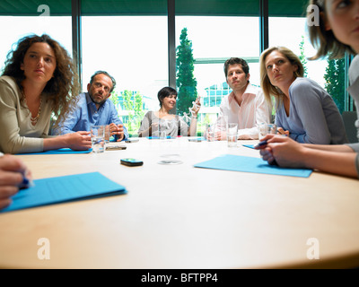 Distracted woman at work Stock Photo
