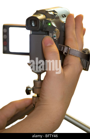 MiniDv camera in man hands with clear white place on display Stock Photo