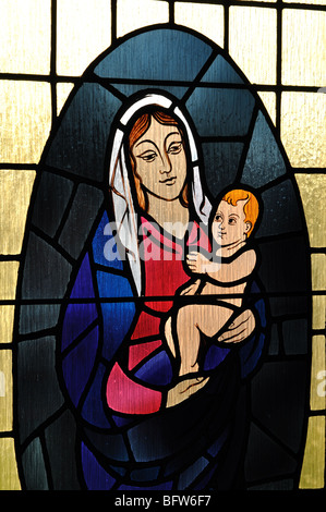 Virgin Mary and child stained glass, All Saints Church, Emscote, Warwick, Warwickshire, England, UK Stock Photo
