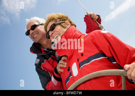 Happy couple sailing yacht Stock Photo