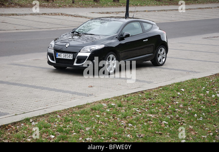 Renault Megane III Coupe 2.0 TCE - 2009 - black metallic - two doors (2D) -  French compact coupe - interior, dashboard, cockpit Stock Photo - Alamy